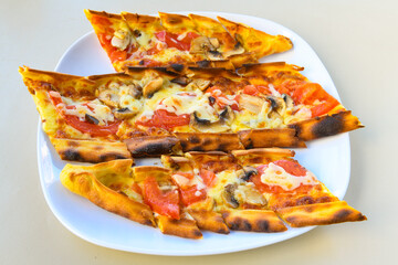 Kiymali pide. Turkish pide with minced meat. Turkish pizza mince pita Pide on white background. Etli ekmek. Kusbasi kasarli, kiymali kasarli, kiymali yumurtali, Bafra, Trabzon, Kusbasili pide.