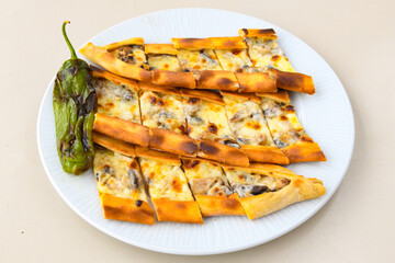 Kiymali pide. Turkish pide with minced meat. Turkish pizza mince pita Pide on white background. Etli ekmek. Kusbasi kasarli, kiymali kasarli, kiymali yumurtali, Bafra, Trabzon, Kusbasili pide.
