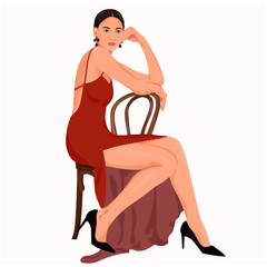Girl in a red dress on a chair
