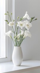 Vase Filled With White Flowers on desk in room , copy space for text