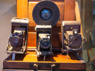 Vintage Cameras Displayed on Antique wood box