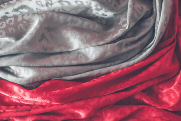 Smooth elegant red and olive green satin texture can use as abstract background. Luxurious...