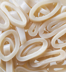Sliced rings raw calamari or squid rings close-up.