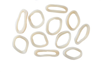 Sliced rings raw calamari or squid isolated on a white background.