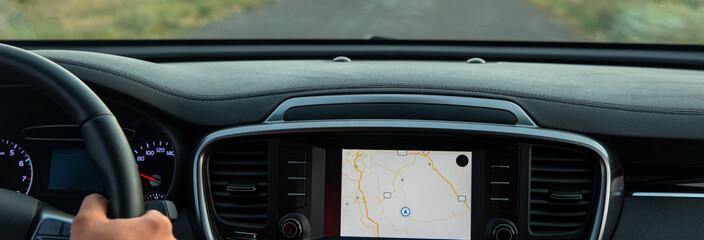 The driver follows the directions of the navigator, photo from inside the car, stock photo