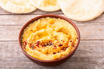 Declicious food from chickpea - hummus .