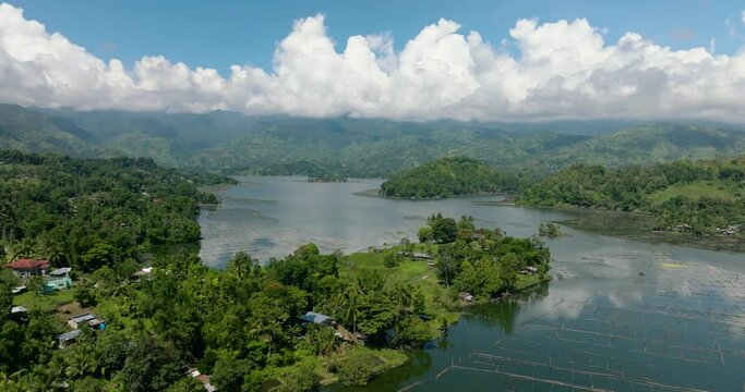 Lake in mountain province, blue sky and clouds. Mindanao, Philippines.