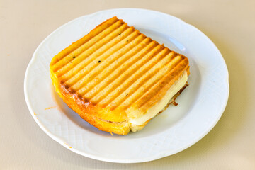 Turkish karisik atom  tost ( kasarli bazlama tost) . Sucuklu, Kasarli, kavurmali karisik tost. Flat baked bread toasted