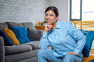 Radiant Success: Latina Woman Thrives in Her Cosy Haven!