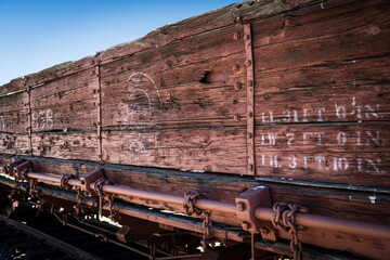 old railway car in a railyard