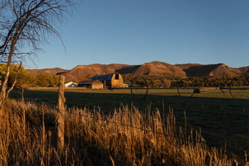 sunset on a farm in the mountains