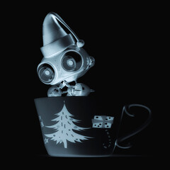 santa helper bot is inside the tea cup - 790439835