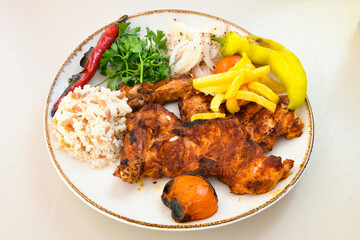 Famous Urfa meat liver, ciger wrapped by lavash with roasted chili pepper, onion and sauce in Sanliurfa, Turkey. Kuzu et ciger sis. Izgara dana bonfile, cop sis, kuzu pirzola. Karisik kebap, beyti keb