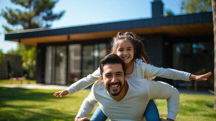 Father and Daughter Play Airplane Outdoors