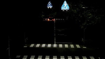 Tokyo,Japan - April 21, 2024: A car on a street in the night in Tokyo, Japan

