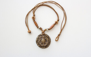 Brazilian handmade necklace sea turtle pendant carved on wood. Indigenous, ethnic, tribal fashion collar for women.