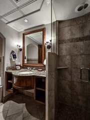 Light bathroom with tile shower