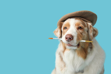 Cute dog in beret and with paint brush on blue background