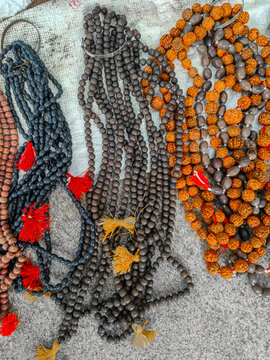 Rudraksha beads & Karungali (black ebony wood) & rosaries & canthymals necklace or neck hang. Traditional spritual beeds selling at Mamallapuram or Mahabalipuram in Tamil Nadu, Great South India.