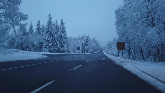 Driving from a driver's perspective on a wintry country road - Part 3