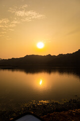 sunset as seen in pokhara, rupa lake