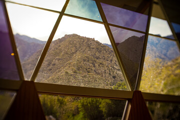Rocky hills through glass windows