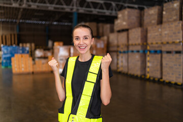Portrait of female supervisor standing in warehouse with looking at camera, Logistic industry...