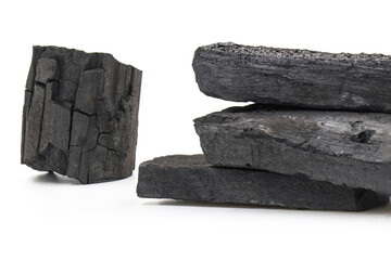 Natural wood charcoal, traditional charcoal or hardwood charcoal isolated on white background. For...