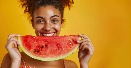 A portrait of a young woman holding a slice of summer watermelon up to her face