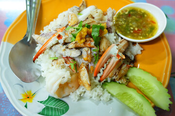 Crab basil fried rice with seafood dipping sauce in Thailand