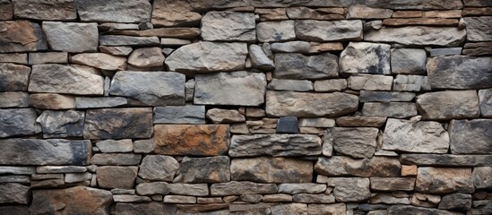 A stone wall background with a fire hydrant in focus
