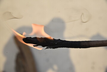 burning match on a fire - 790544298