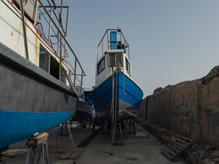 Small fishing and leisure boats are placed in storage at the marina in Yafo (Jaffa), part of the Tel Aviv metropolitan area in Israel.