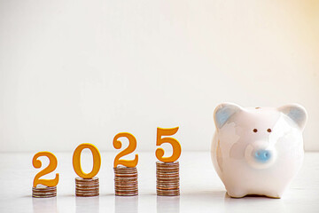 2025 New year saving money pig piggy bank with Wooden number 2025 Gold color on coins stack. Money-saving concept