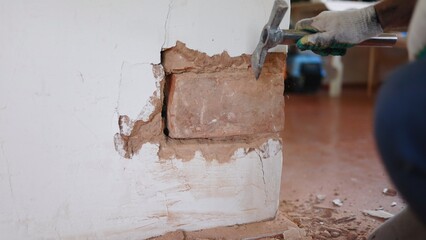 Repair a home brick oven for cleaning.