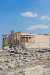 Obraz premium The Erechtheion temple with its iconic columns stands majestically atop the Acropolis in Athens Greece