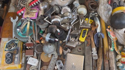 A flea market of old rusty things and tools.
