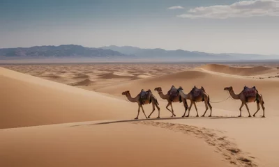 Fotobehang A caravan of camels slowly wanders through the dunes of the great desert. © sv_production