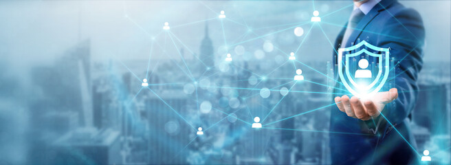 Businessman holding authorization icon, networking and data exchanges, secure connections, trustworthy transactions, reliable service, protected information, and a secure network.