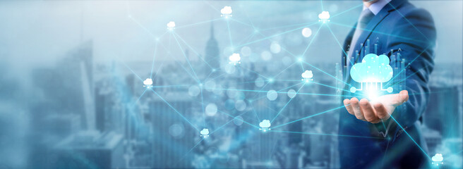 Businessman holding cloud computing icon, networking and data exchanges, cloud connection, storage,...