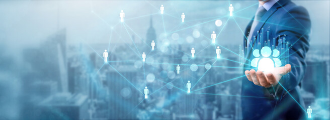 Businessman holding HR icon, networking and human resource management, fostering connection, talent...