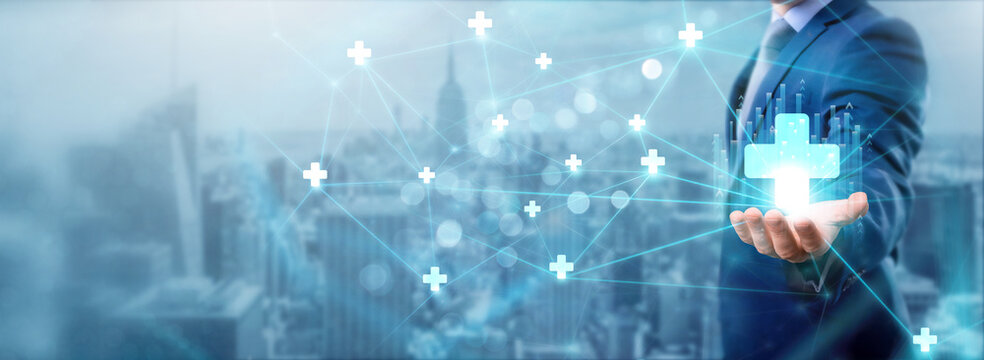 Businessman holding health IT icon, networking and enhancing healthcare efficiency, digital connection, improving patient care, healthcare service, innovative technology, and interconnected network.