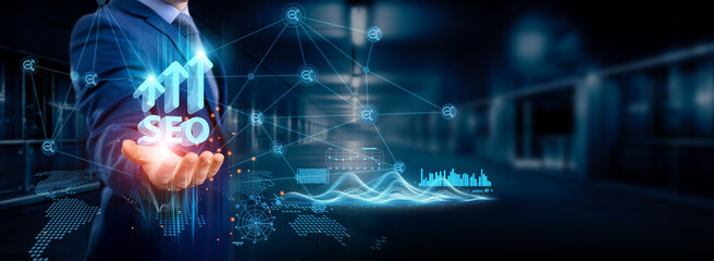 Businessman holding SEO icon global structure, networking and data optimization connection, digital...