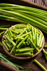 fresh garlic bolt on wooden table.