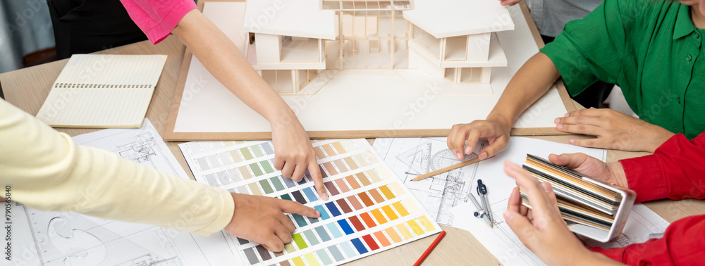 Poster skilled architect team discuss about house construction while interior designer point an appropriate