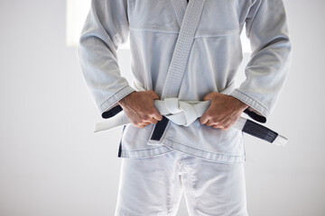 Man, closeup or belt for martial arts sport in fitness center for self defense, fighting or...