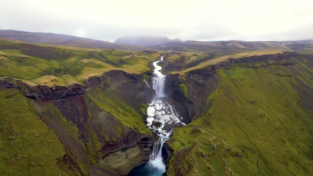 Epic Wide Aerial Tour of Eldgja Canyon Landscape Iceland. Drone Flies Back to Reveal Remote Colorful Travel Destination. 4K High Quality Color Corrected.