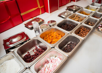 Ingredients for making handmade chocolates and candies in a workshop - 790575645