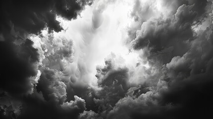 Beautiful cloudy sky in a black and white photograph on a rainy day - obrazy, fototapety, plakaty