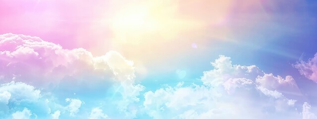 Soft blue sky, white clouds, gradient, and rainbow-colored pastels all come together to create a stunning blurred pastel background.